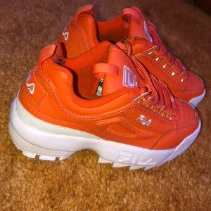 Bright orange platform FILA’s size 7.5 unisex